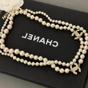 CHANEL Ivory Pearl Necklace with Gold Details